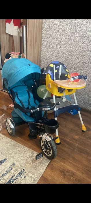 Детский велосипед и сведения стул