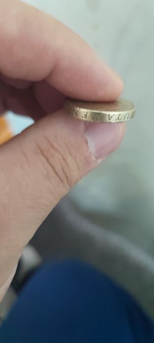 monedă de 1£ cu eroare