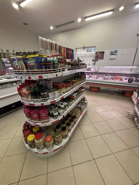 Заоблени рафтове за островен стелаж - гондола.