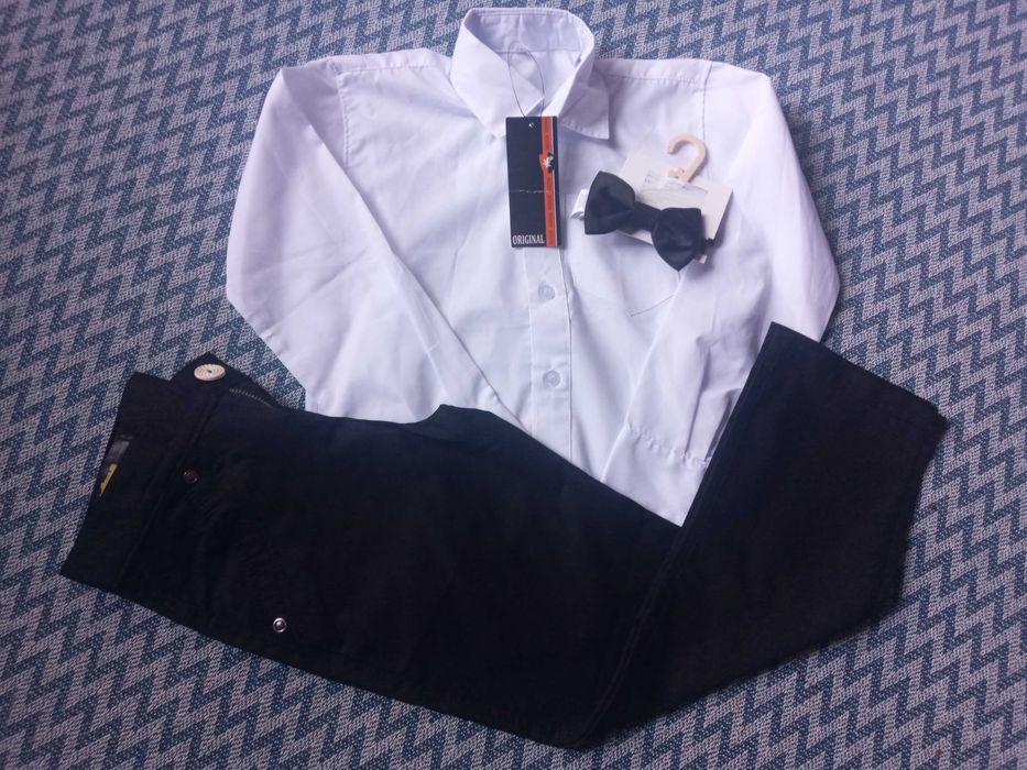 Новая рубашка,новые брюки и фирменная бабочка для школы