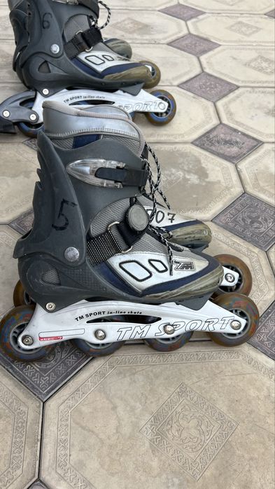 Роликовые коньки