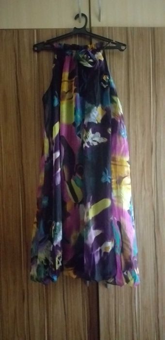 Дамски рокли и жилетки. Всяка на цена от  30 до 80лв.