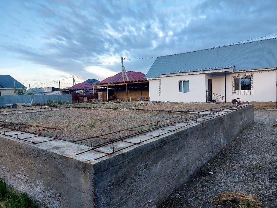 Кала ишинен жаксы уй, времянка