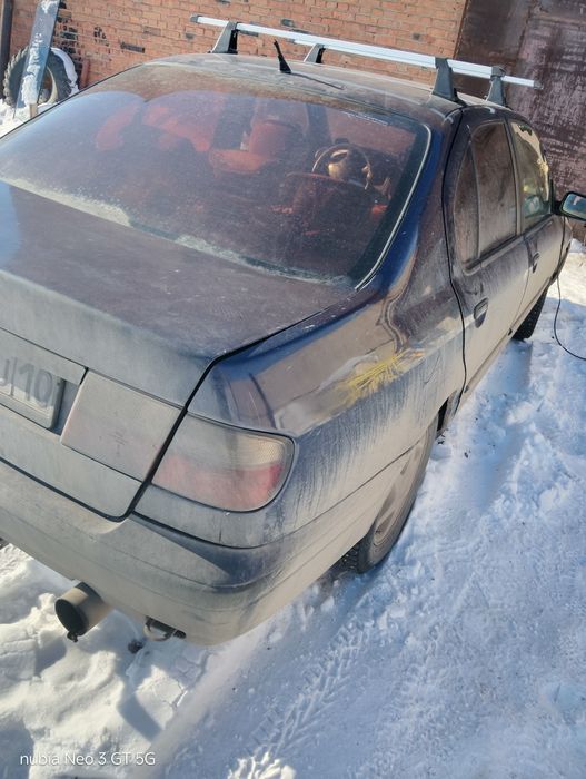 Ниссан премьера р11