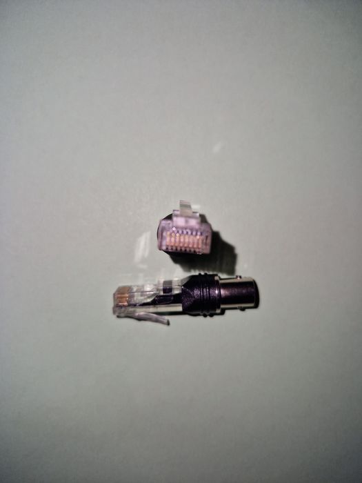 Vând 2 adaptoare Rj45 Tata-BNC mamă,  noi nouțe