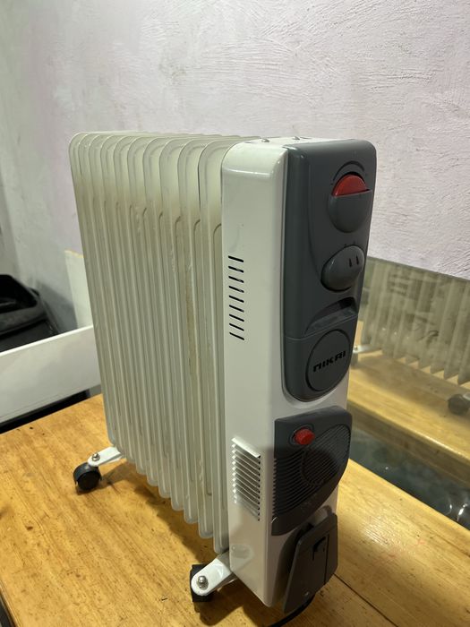 Масленный обогреватель