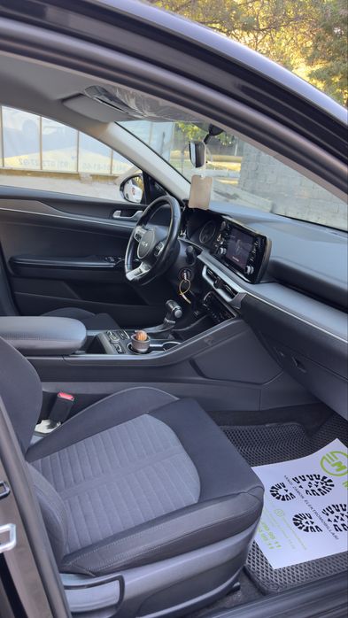 Kia k5 comfort pazitsiya