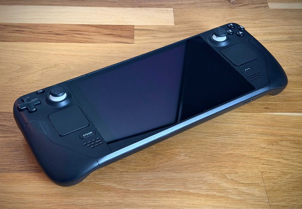 Steam Deck LCD 256GB – stare foarte bună, husă + încărcător original