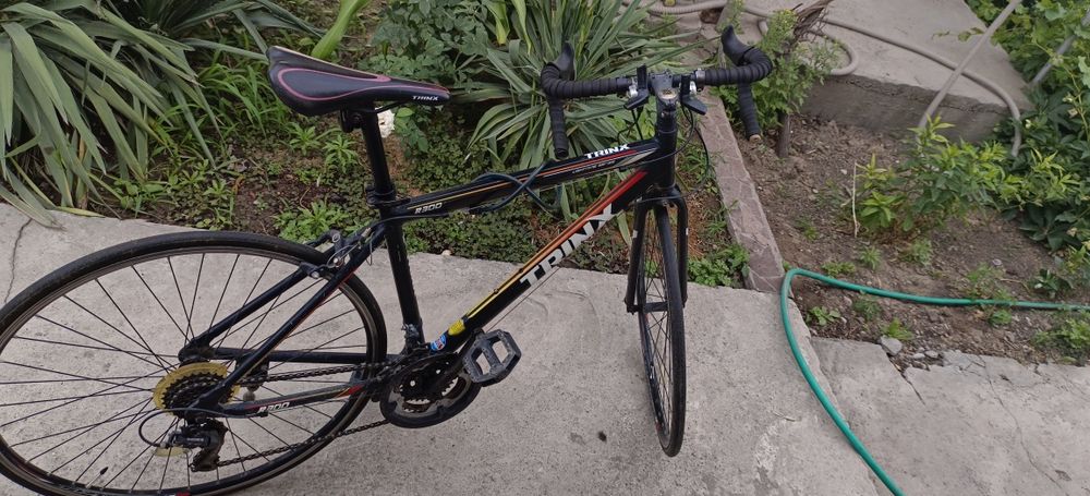 Шоссейный велосипед TrinX