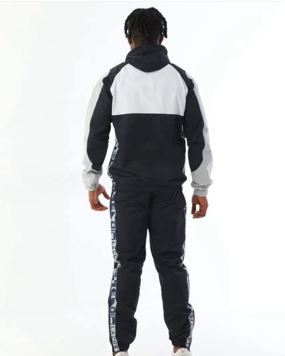 Спортивные костюмы Lacoste