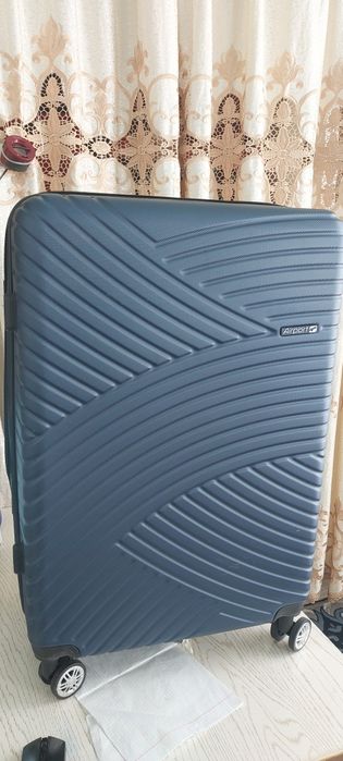 Чемодан  полипропилен  оригинал  сифатли  ,   очень прочный и ка