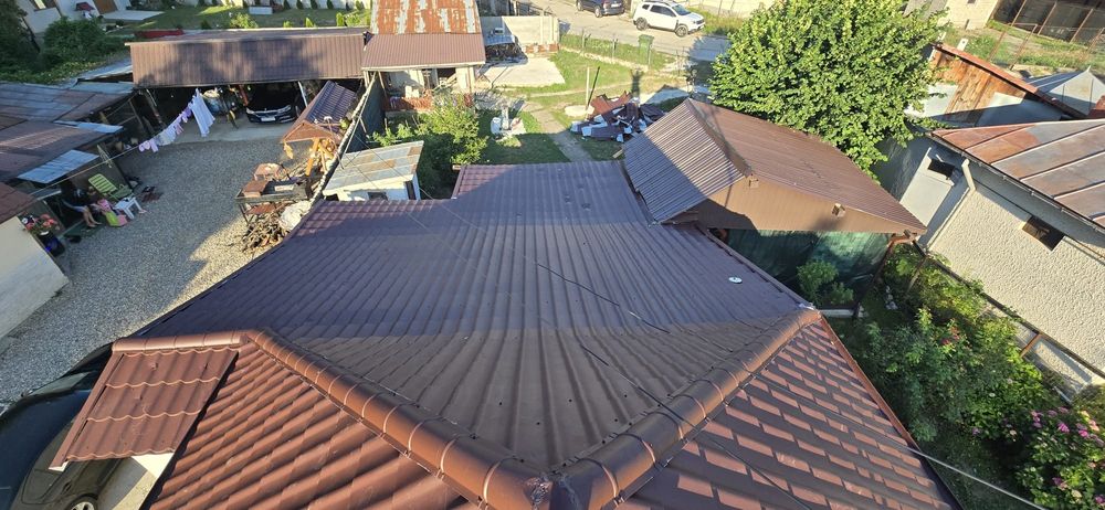 Reparații acoperisuri montaj dulgherie montaj țiglă metalica masardari montaj țiglă ceramica Reparații de urgență foișoare izolati acoperis bloc.
