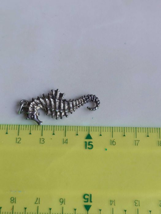 Pandantiv din argint cu reprezentarea unui Calut de mare