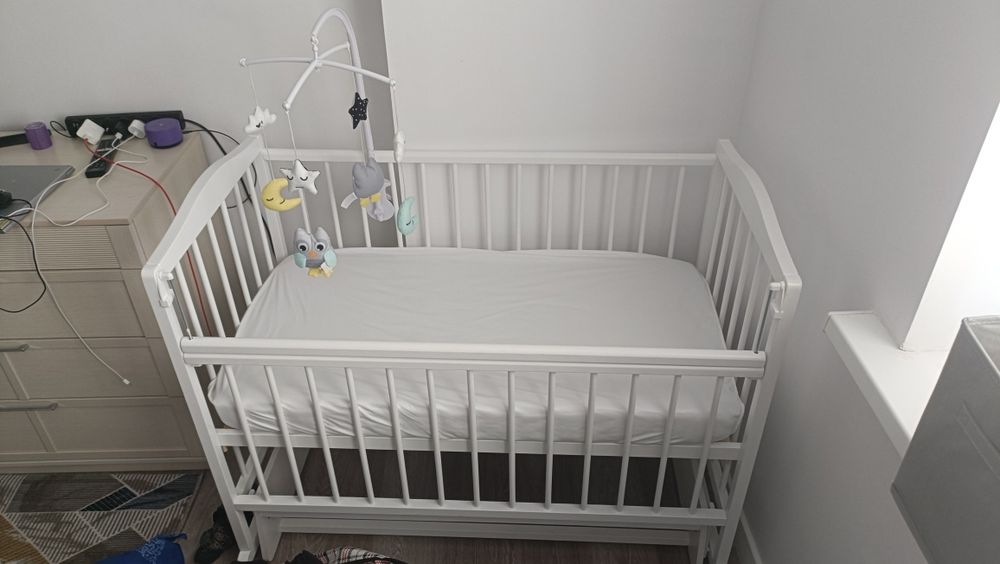 Детская кроватка маятник