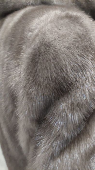 Меховые жилеты из норки и тасканы