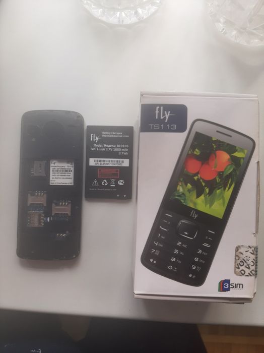 Новый Fly  на 3 симкарты