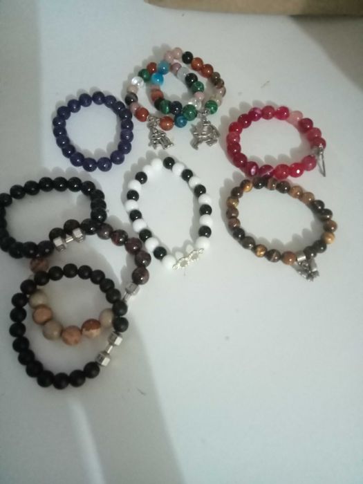 Браслеты с талисманами Дзи