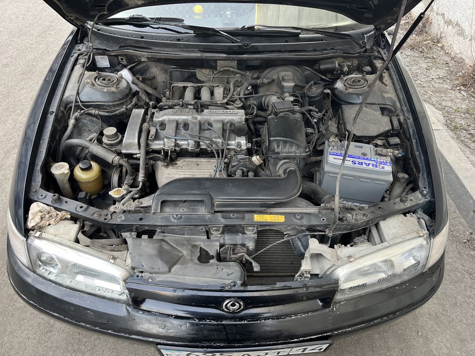 Машина мазда кроносс