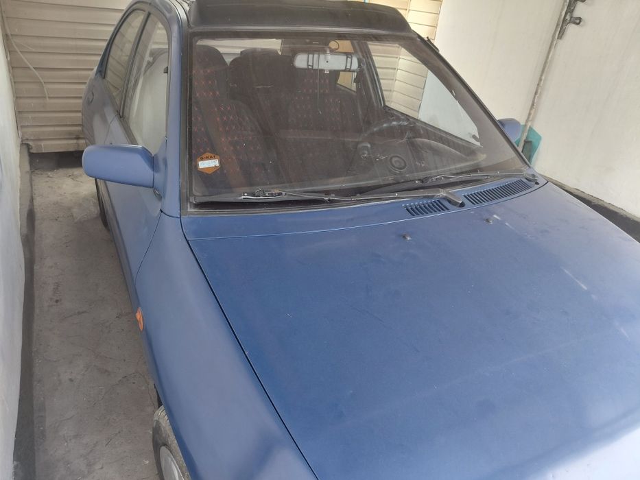Продам Mazda 121