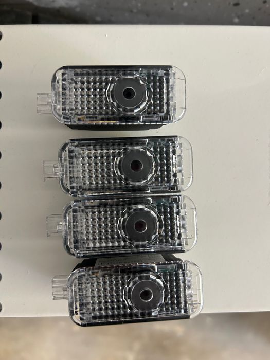 ОригиналноОсветление за врати за Ауди  А4;Чисто нови