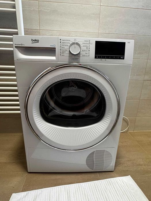 Uscator de rufe Beko  B3T41242 cu pompa de caldura