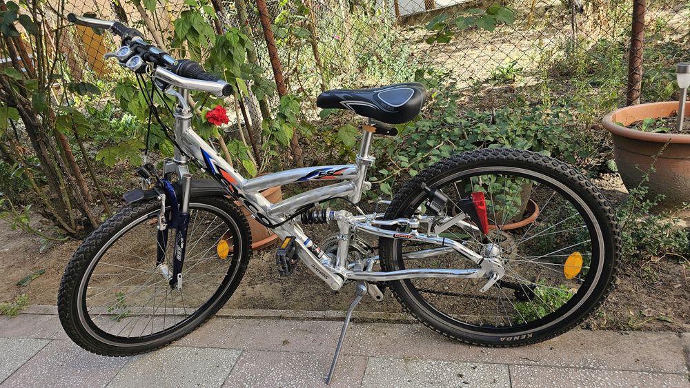 Bicicletă MTB Full Suspension 24", echipare Shimano - 450 lei