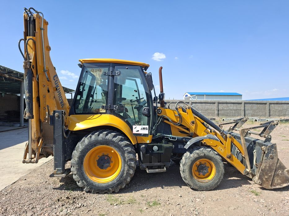 Экскватор погрузчик сотилади