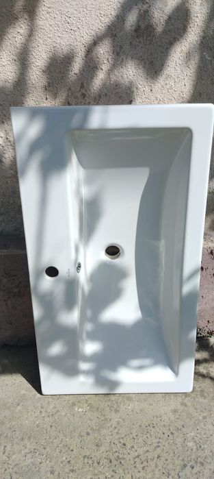 Продам керамическую раковину