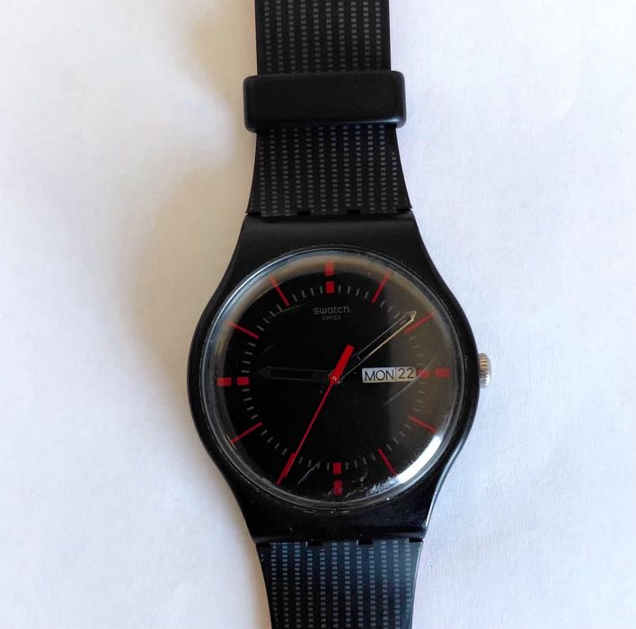Ceas Swatch culoare negru-Fabricat in Evetia-folosit putin