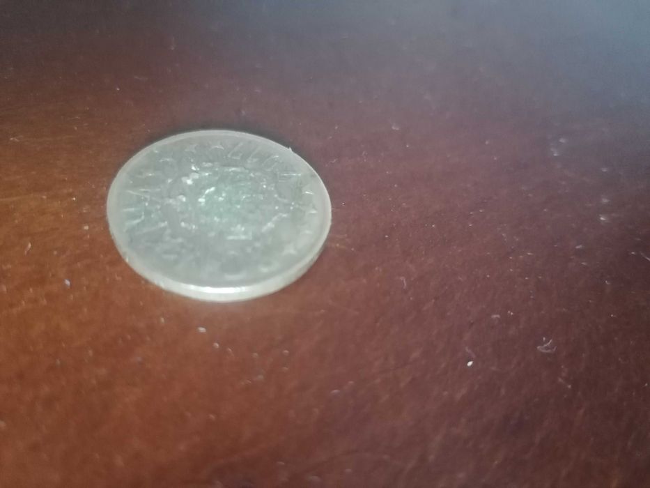 Modeda de 50 de bani cu eroare de fabricare fiarte rara