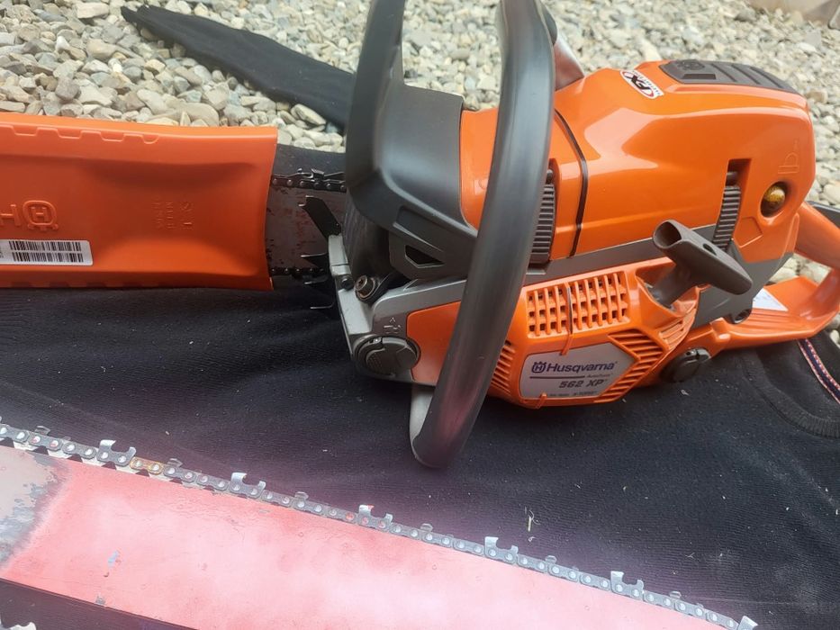 Husqvarna 562 XP cu garanție .Fara urme  sau zgârieturi