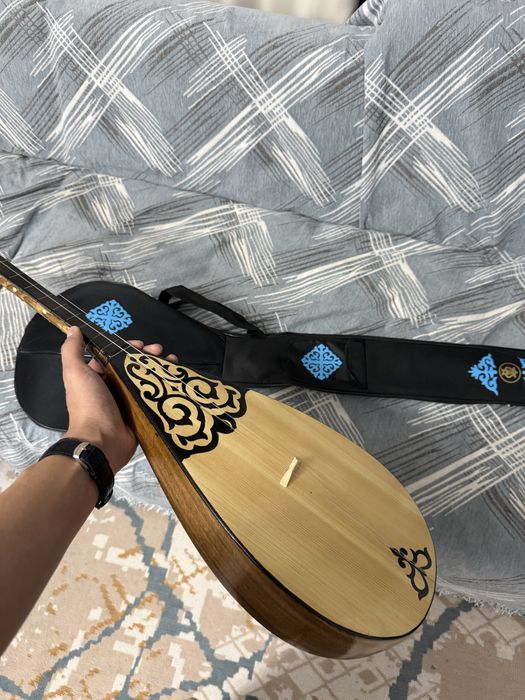 Домбыра как новый