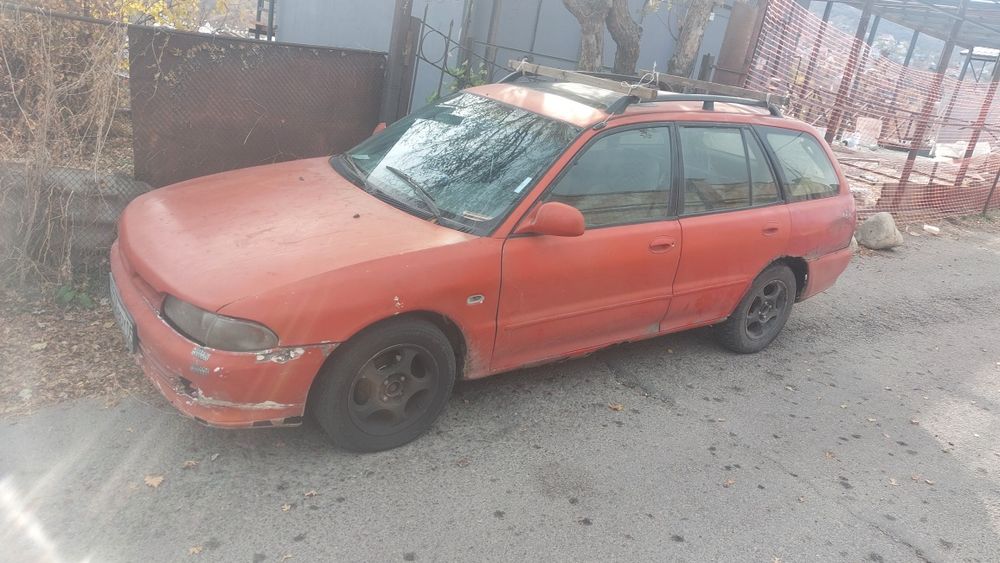 Автомашины лансер