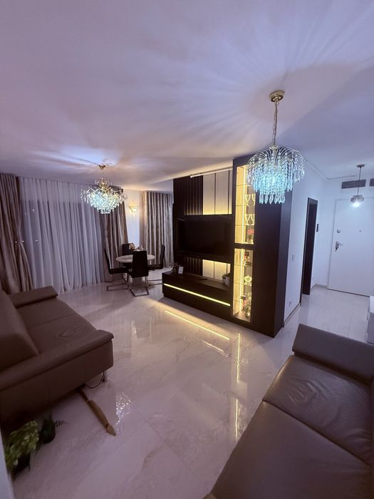 Inchiriez apartament trei camere LUX  Prima  WISTA CU LOC PARCARE CU PRIZA  INCARCARE MASINA