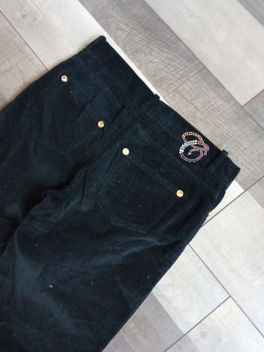 Женские брюки Италия