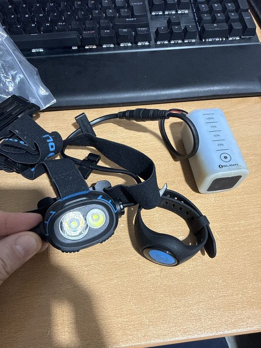 Lanterna frontala Olight 27 wave cu telecomanda