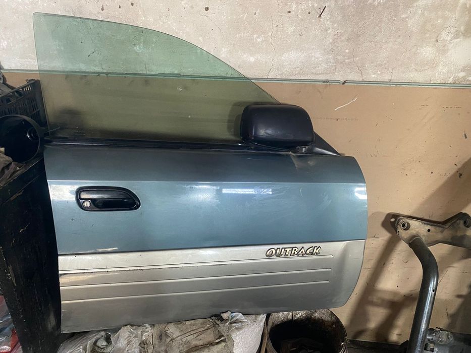 Двери Subaru outback 2003
