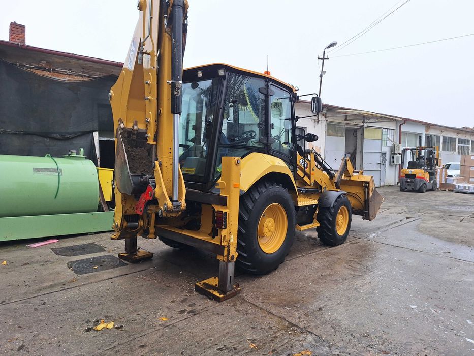 Vand buldoexcavator cat 428