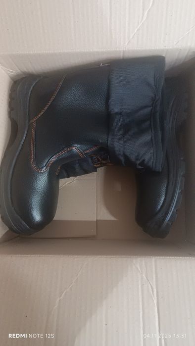 Продам новые сапоги