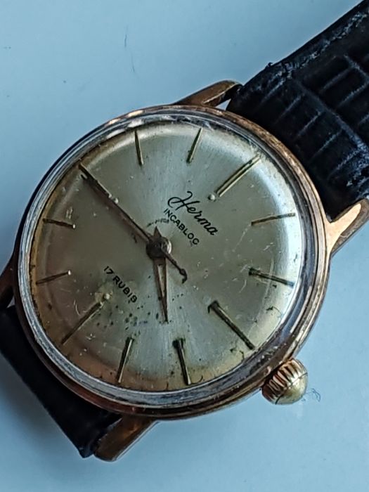 Ceas Herma Placat cu aur Int. Manuala Funcționează excelent!