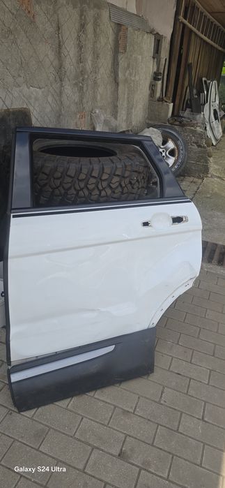 Usi range rover evoque stanga cu avarie vezi poze