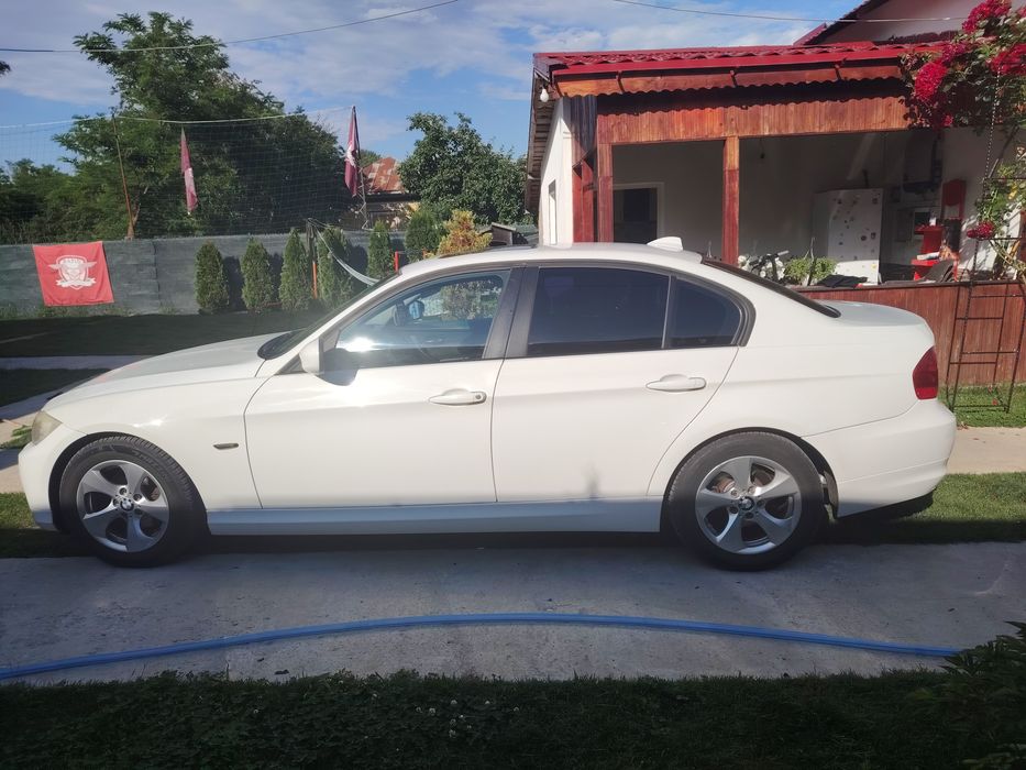 Vând BMWe90  an 2011