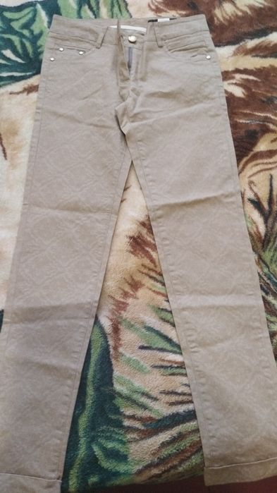 Продам брючки новые
