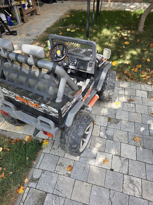 Maşinuță electrică Peg Perego Gaucho Rock'in - 2 locuri, camuflaj nouă
