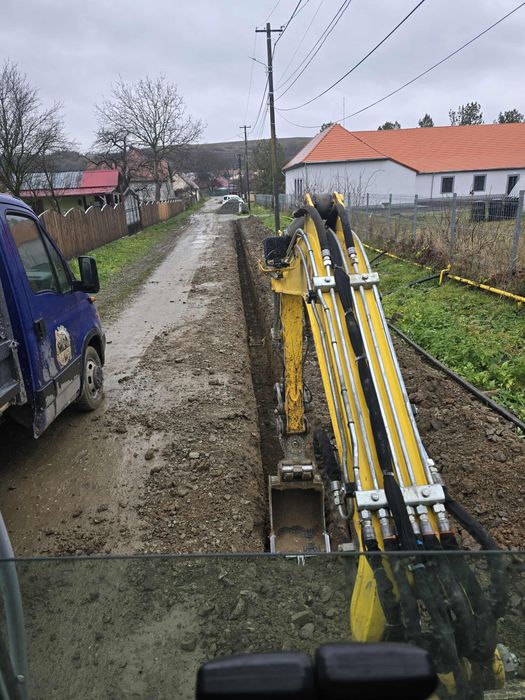 Închiriez miniexcavator / transport basculabil excavator