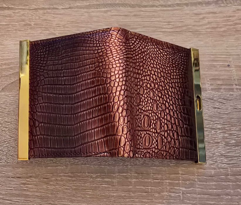 Portofele  de damă din piele și altele din material textil