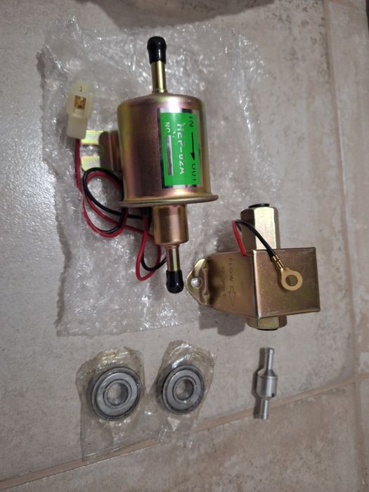 Rola intinzatoare curea +parbriz orig si diverse piese de  scuter Honda Pantheon 125 150cc