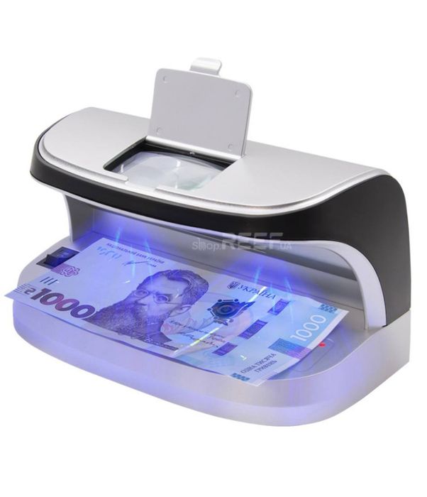 Детектор подделок, проверяет банкноты, чеки, паспорта