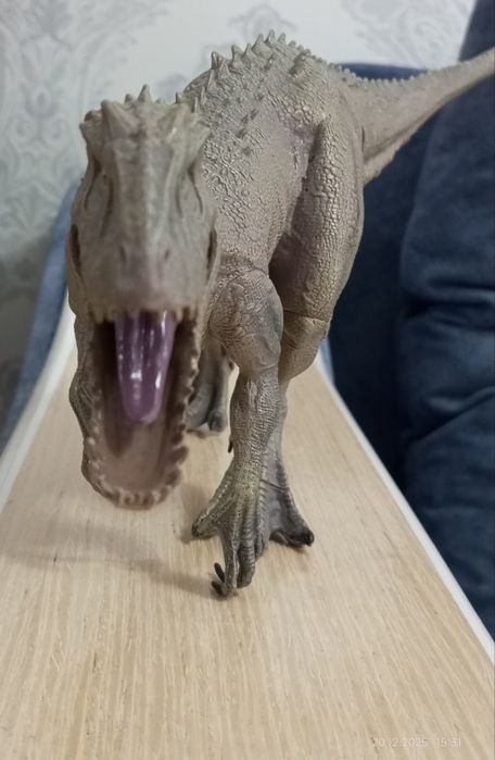 Игрушка динозавр