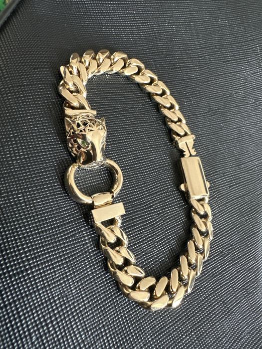 Браслет барс с зелеными глазами,